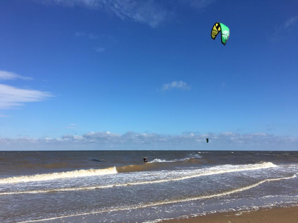 Free Image of Paragliding at beach  