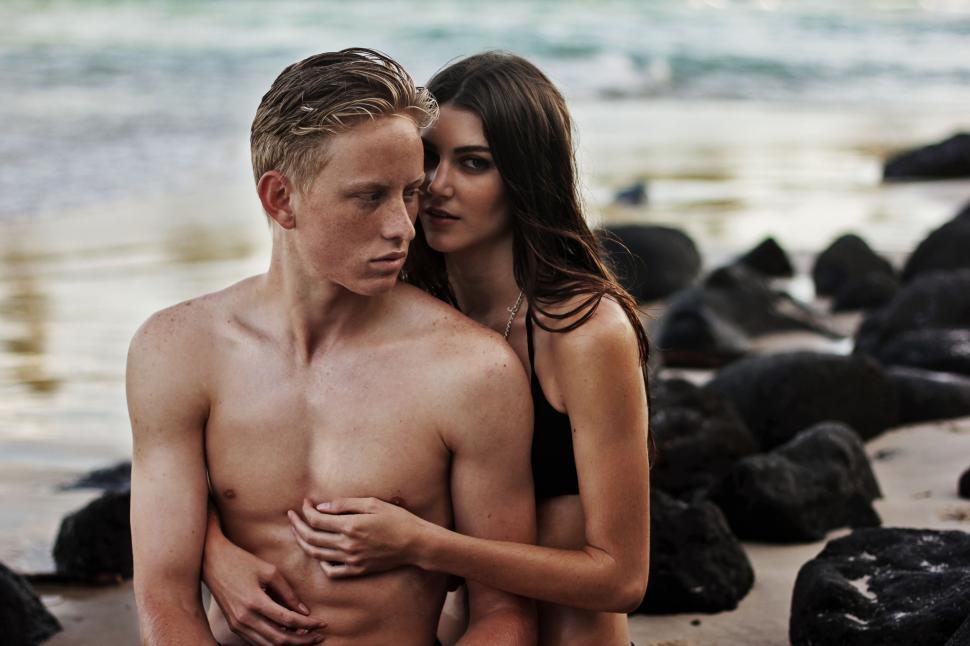 Download Free Stock Photo of Sensual Couple on beach 