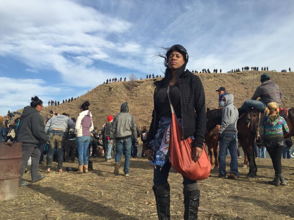 Free Image of African Woman And People Near Mountain  