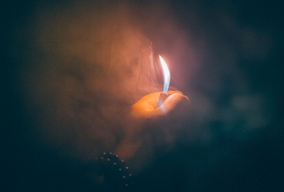 Free Image of Lighter in Hand  