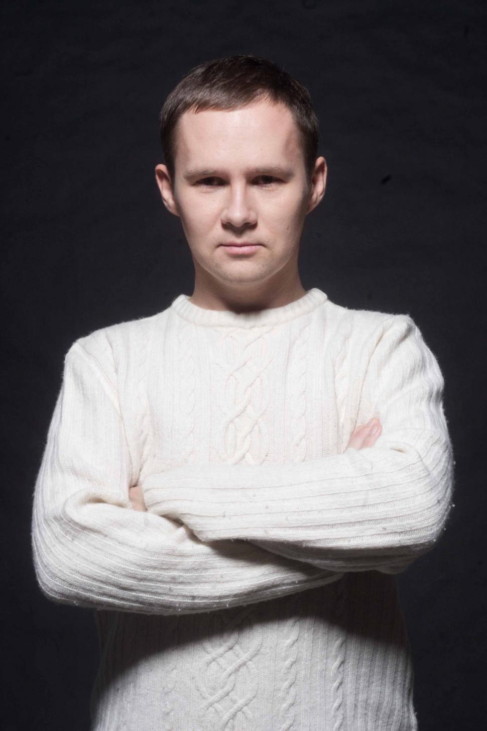 Free Image of Portrait of Caucasian Man in White Sweater 
