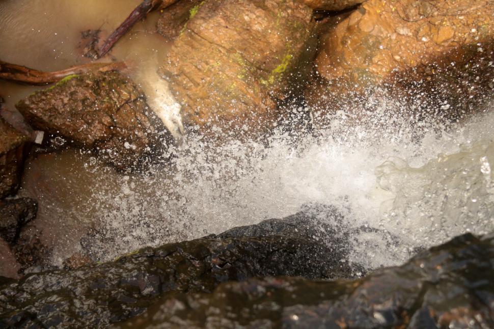 Free Image of Splashing Water on Rock 