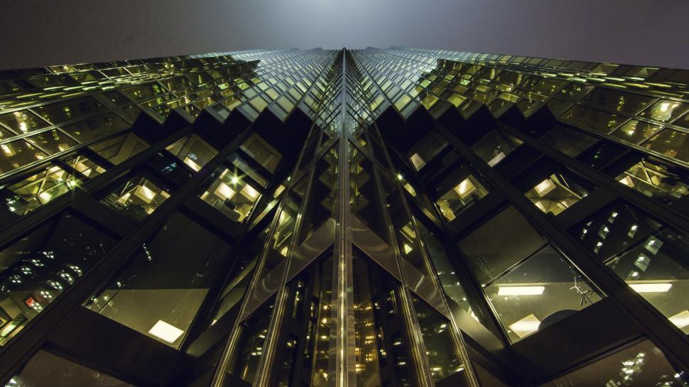 Free Image of Night View of Glass Building From Below  