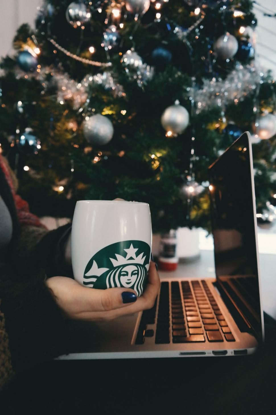 Free Image of Starbucks Coffee Mug and Christmas Tree 