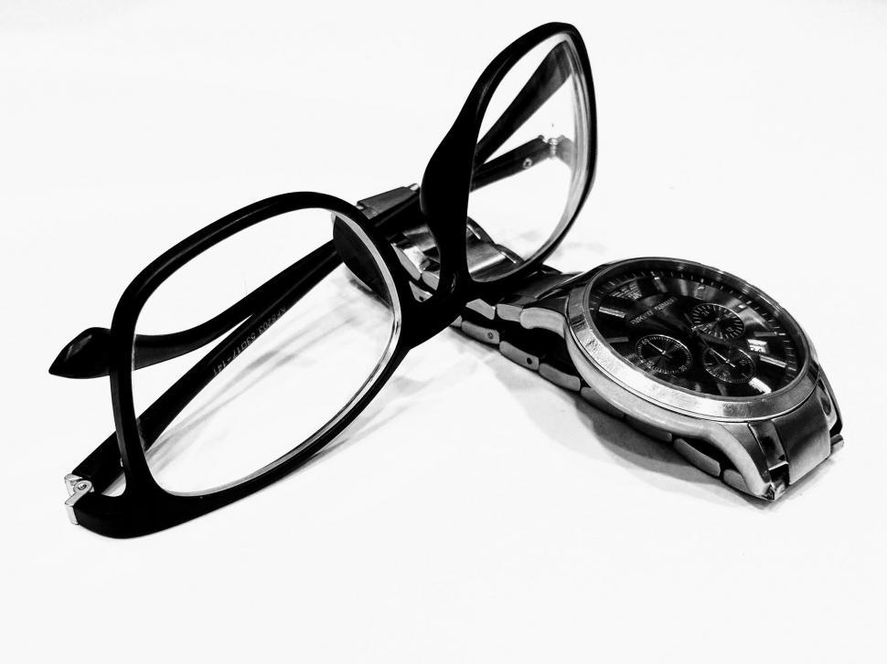 Free Image of Eye Glasses and Watch  