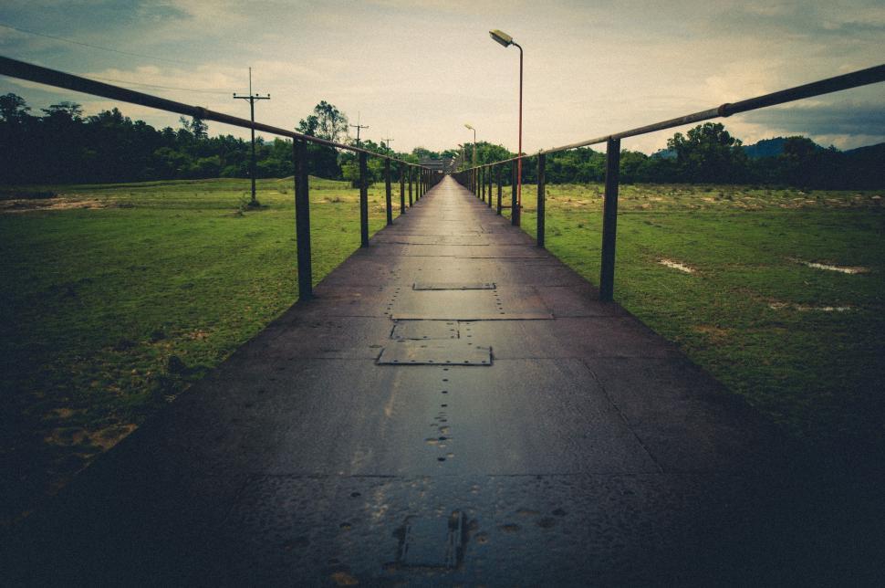 Free Image of Metal Footpath with street lamps 