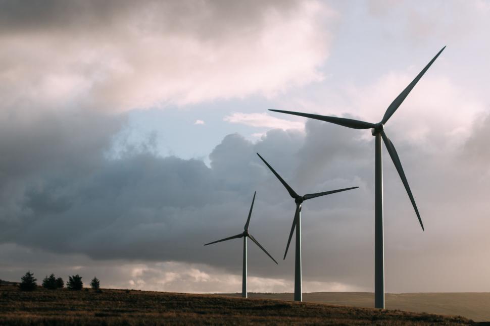 Free Image of Wind turbines and cloudy sky  