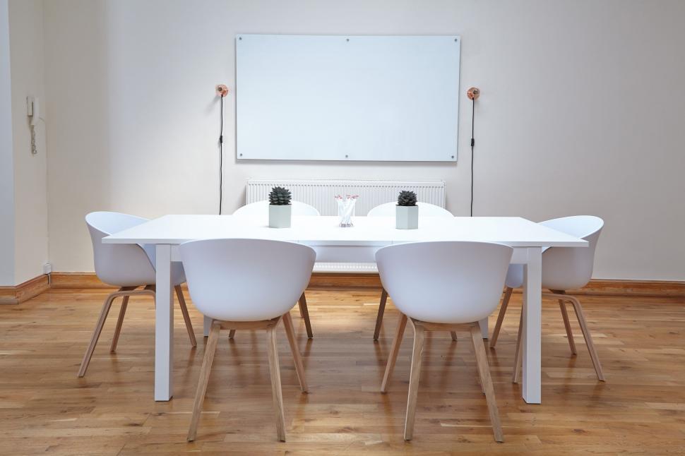 Free Image of White Chairs and Whiteboard  