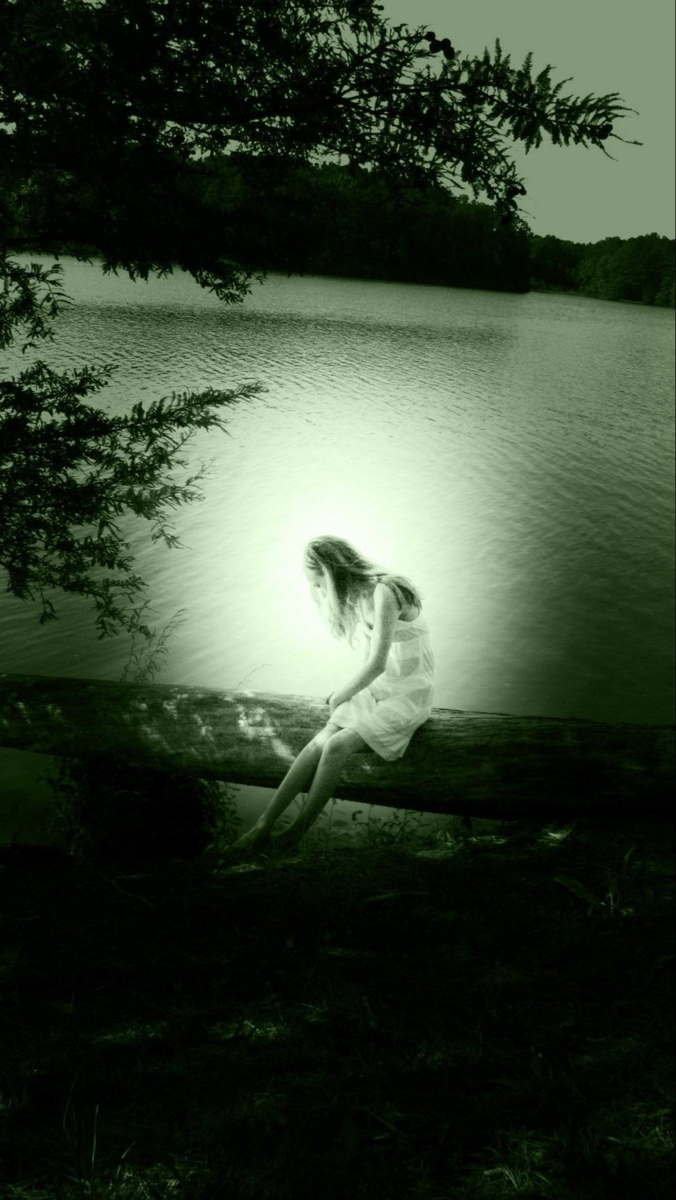 Free Image of Alone Woman With Lake and Trees  