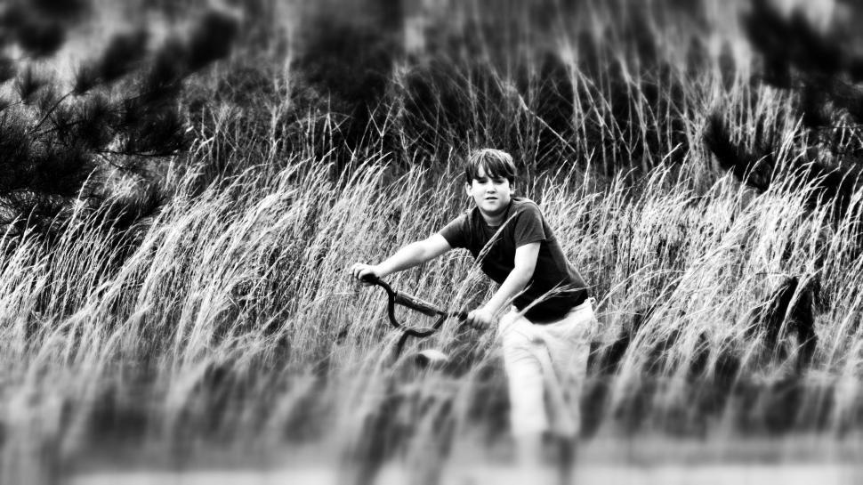 Free Image of Young Boy With Bicycle  