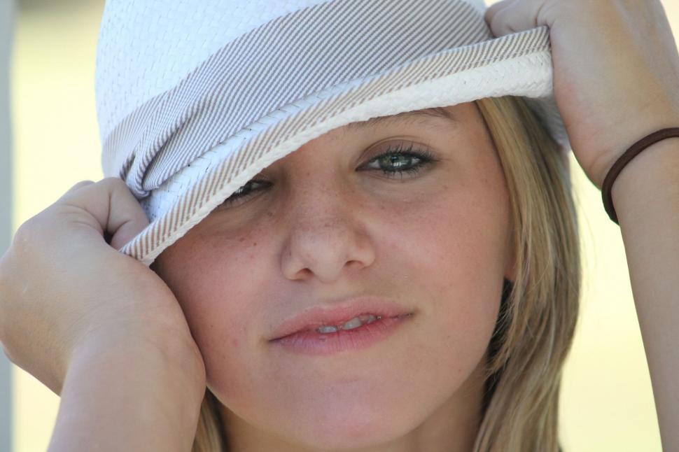 Free Image of Close up of Young Girl face with hat 