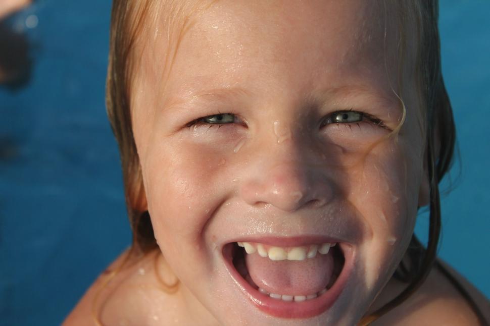 Free Image of Smiling Little Boy in Swimming Pool  