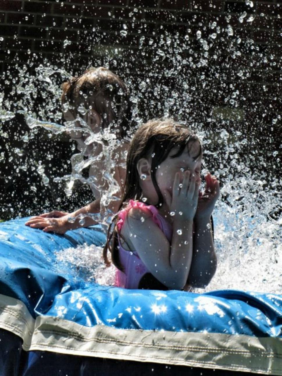 Free Image of Children Splashing In Water  