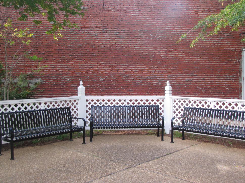 Free Image of Benches and Brick Wall 