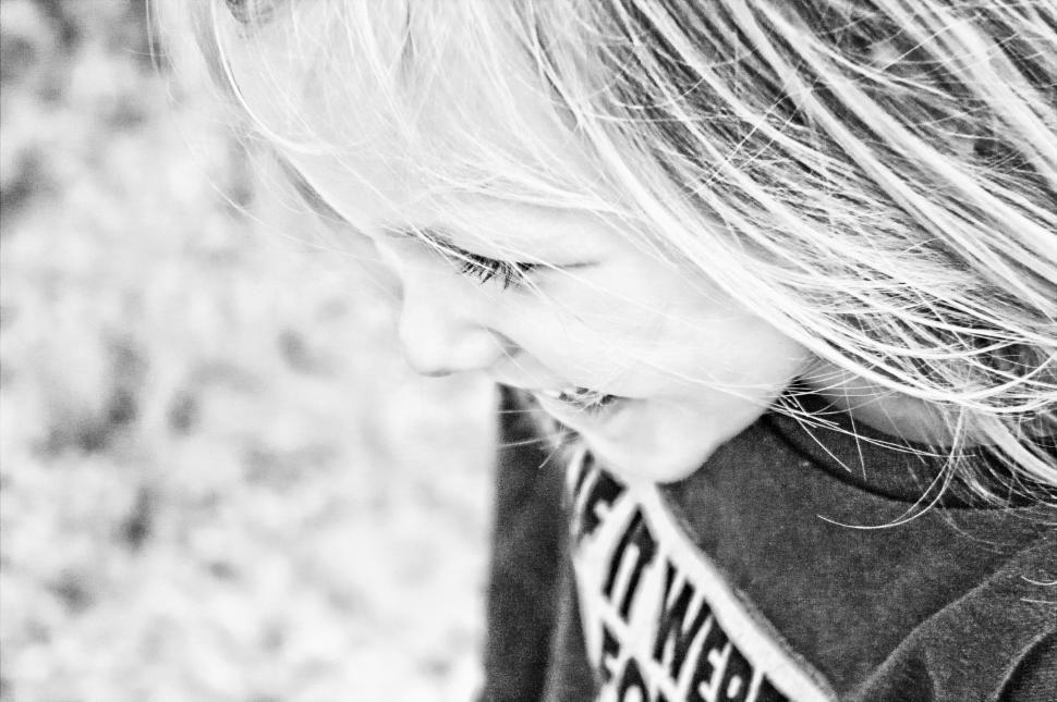 Free Image of Black and white view of Little Girl With Blonde Hair 