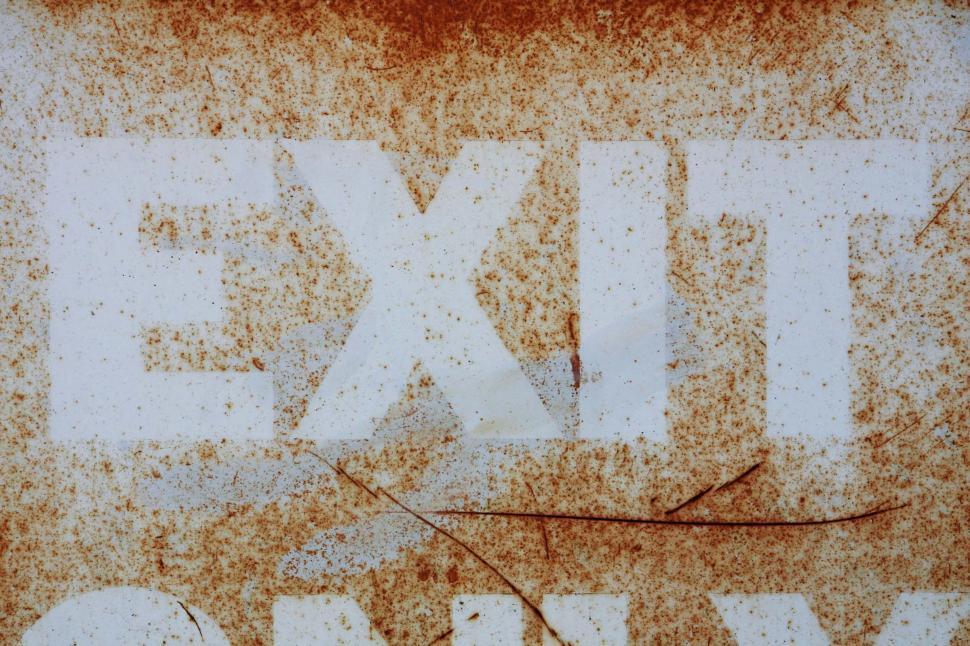 Free Image of Weathered exit sign 