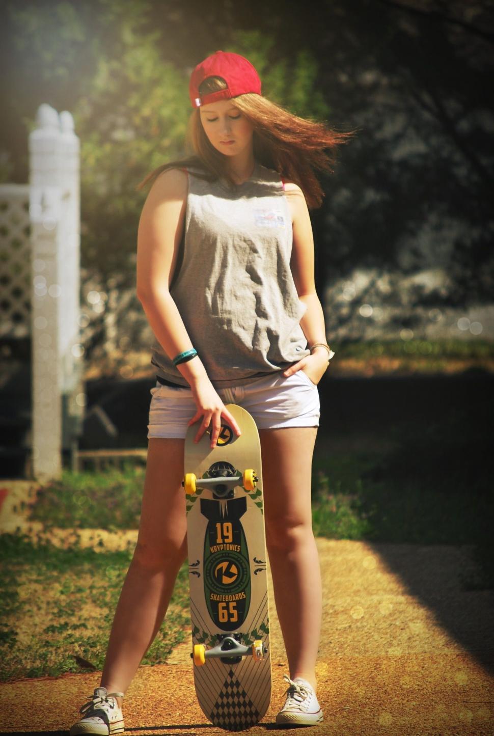 Free Image of Stylish Woman With Skateboard - Looking Down  