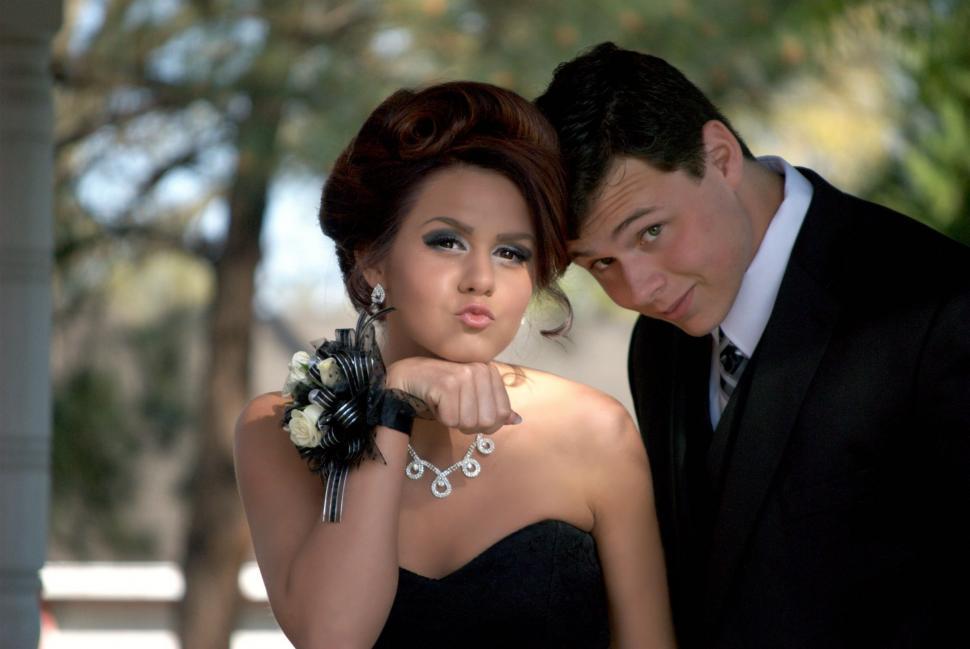 Free Image of Teenage couple dressed up for prom - Making Faces  
