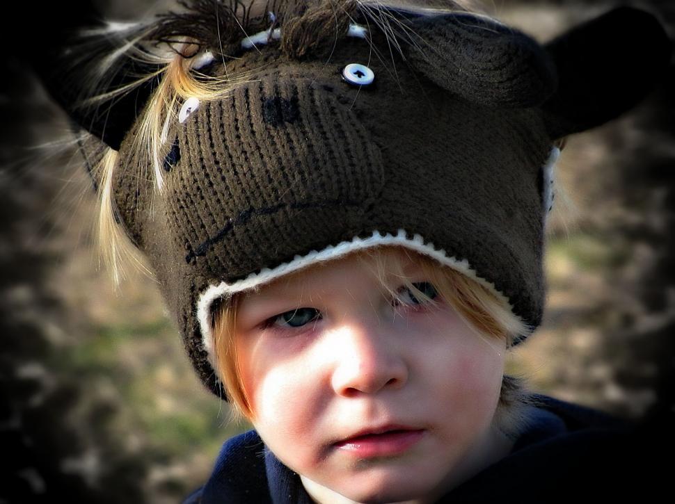 Free Image of Little Boy in Black Winter Hat  