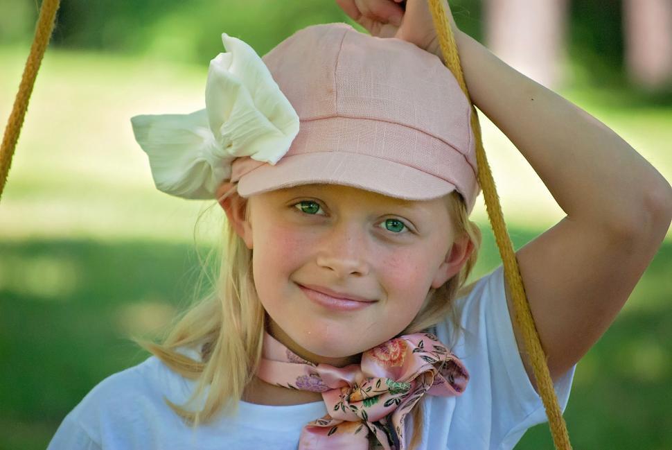 Free Image of Stylish Teenage Girl in Pink Cap - Looking at camera  