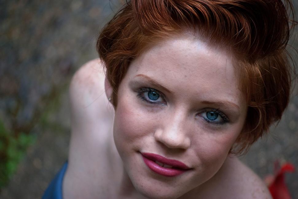 Free Image of Young Smiling Woman With Red Head  