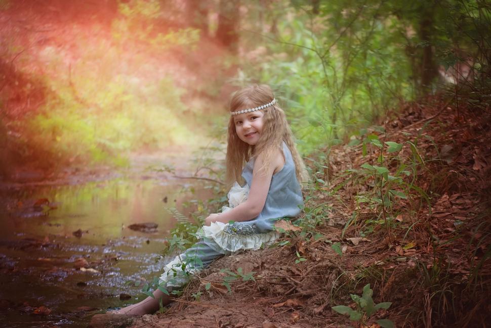 Free Image of Little Girl in Forest - Looking at camera  