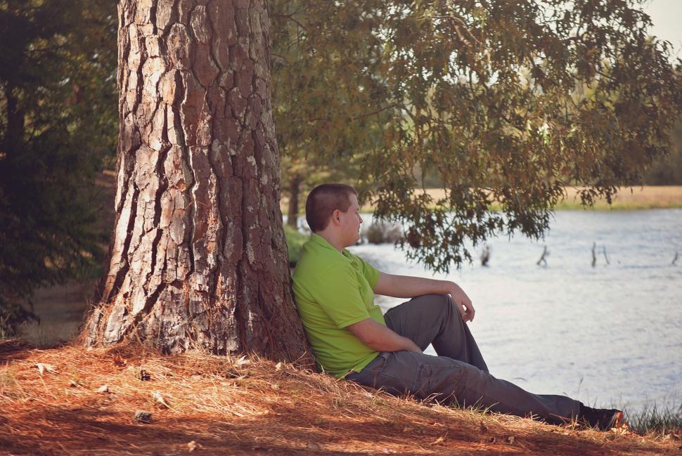 Download Free Stock Photo of Alone Man Sitting Under Tree - Thinking  