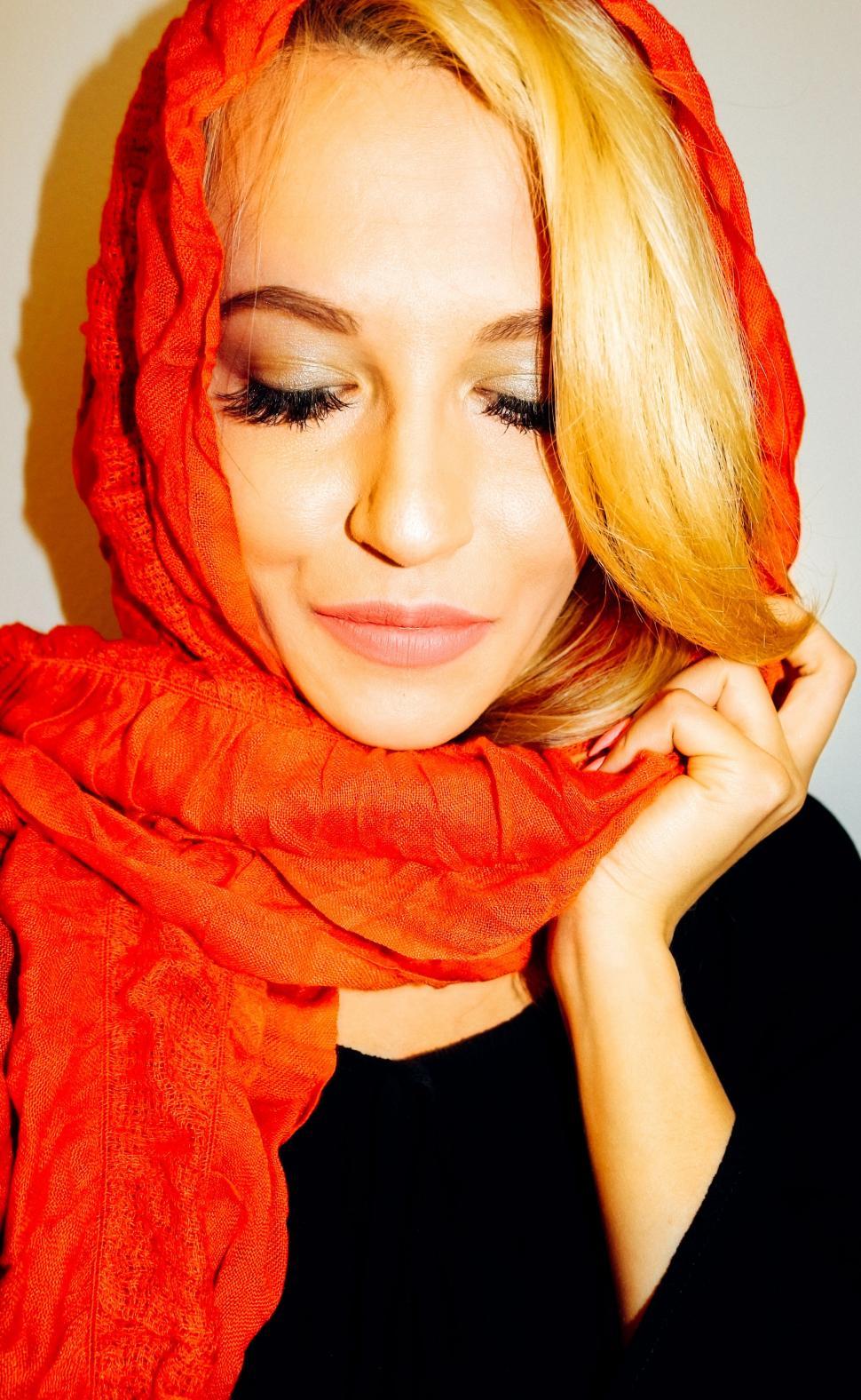 Free Image of Smiling Woman with orange scarf 