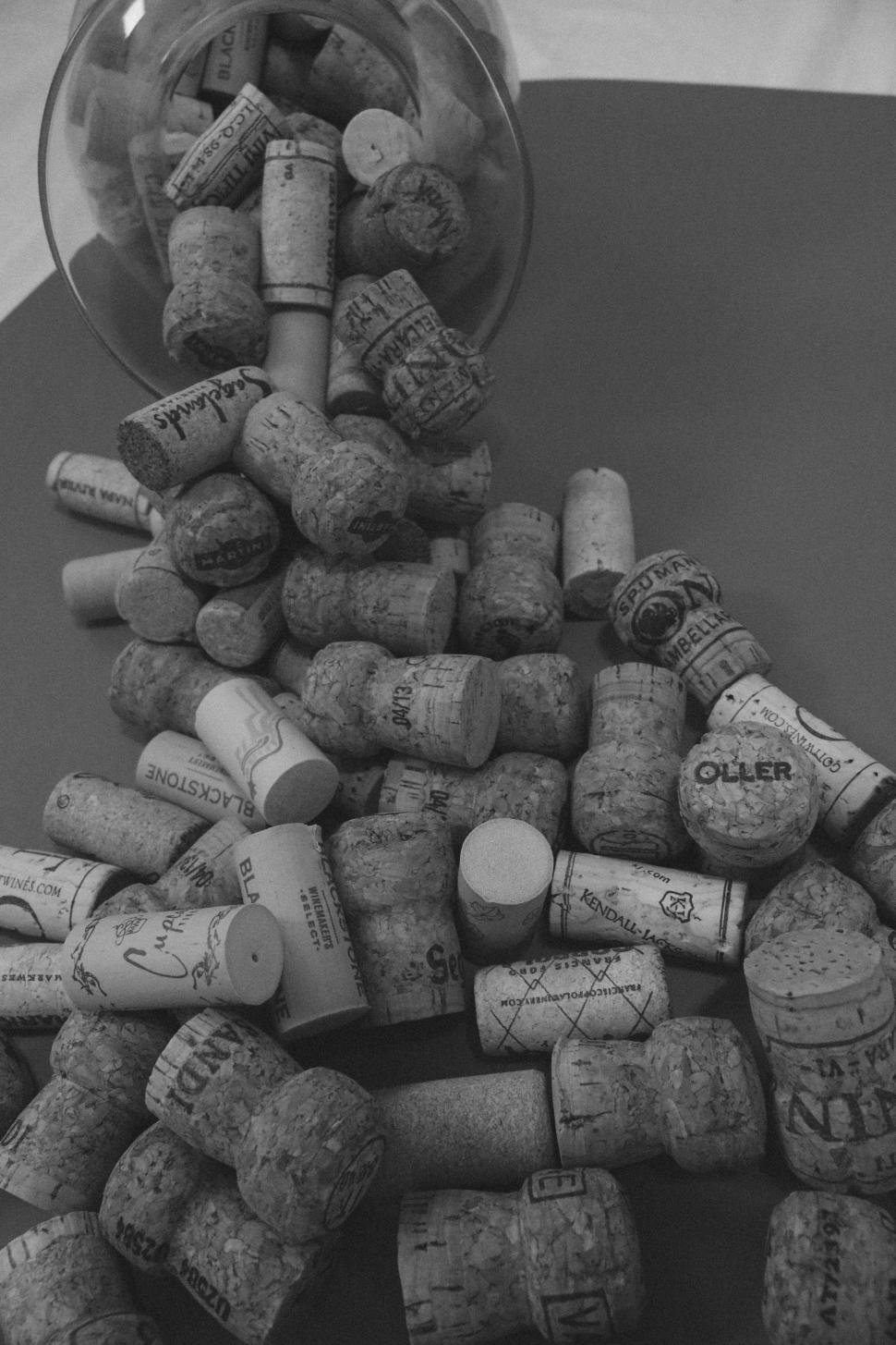 Free Image of Wine corks and glass vase  
