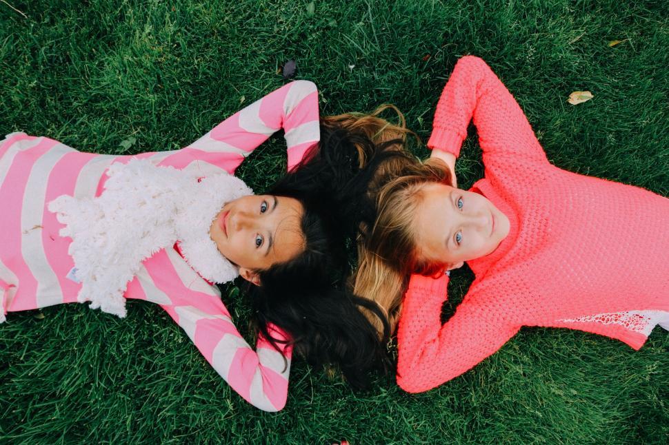 Free Image of Two Teenage Girls And Green Grass  