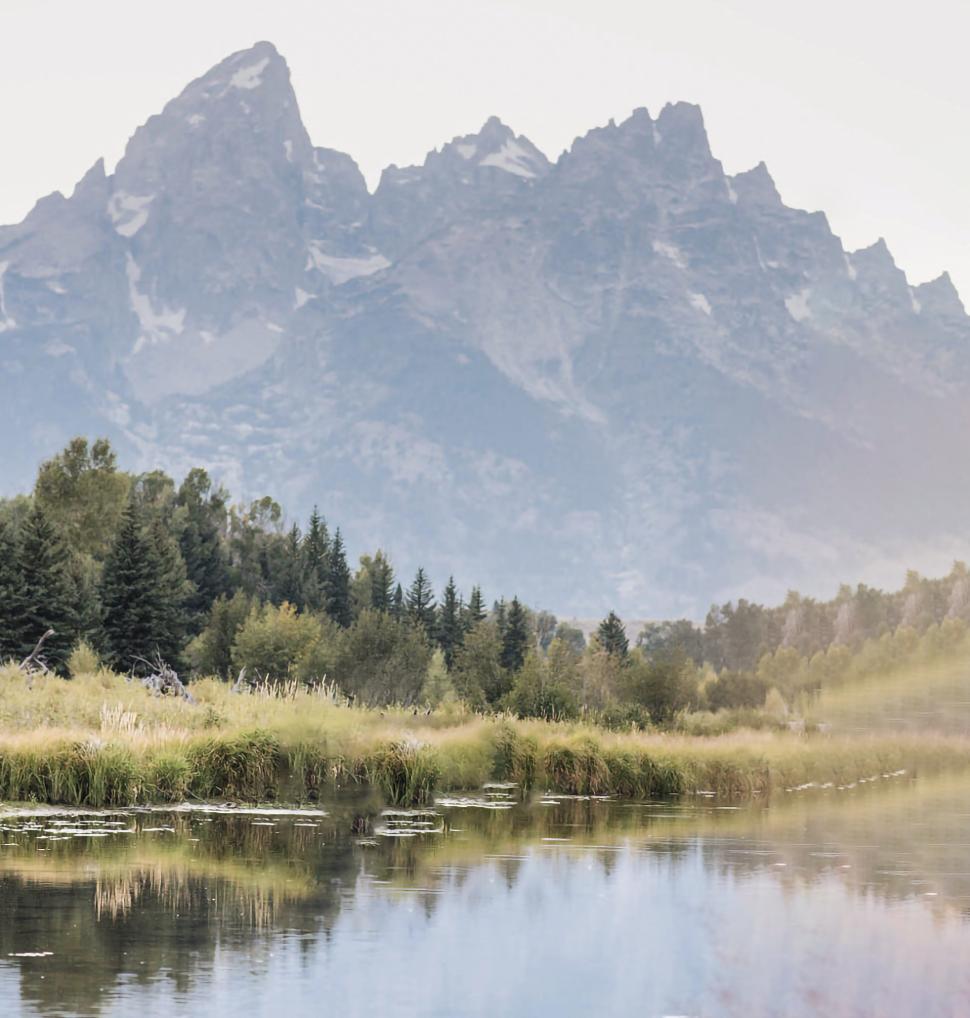 Free Image of Mountain Range Reflection in Still Lake 