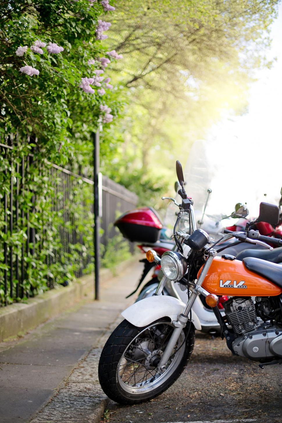 Free Image of Motorcycle parked outside  