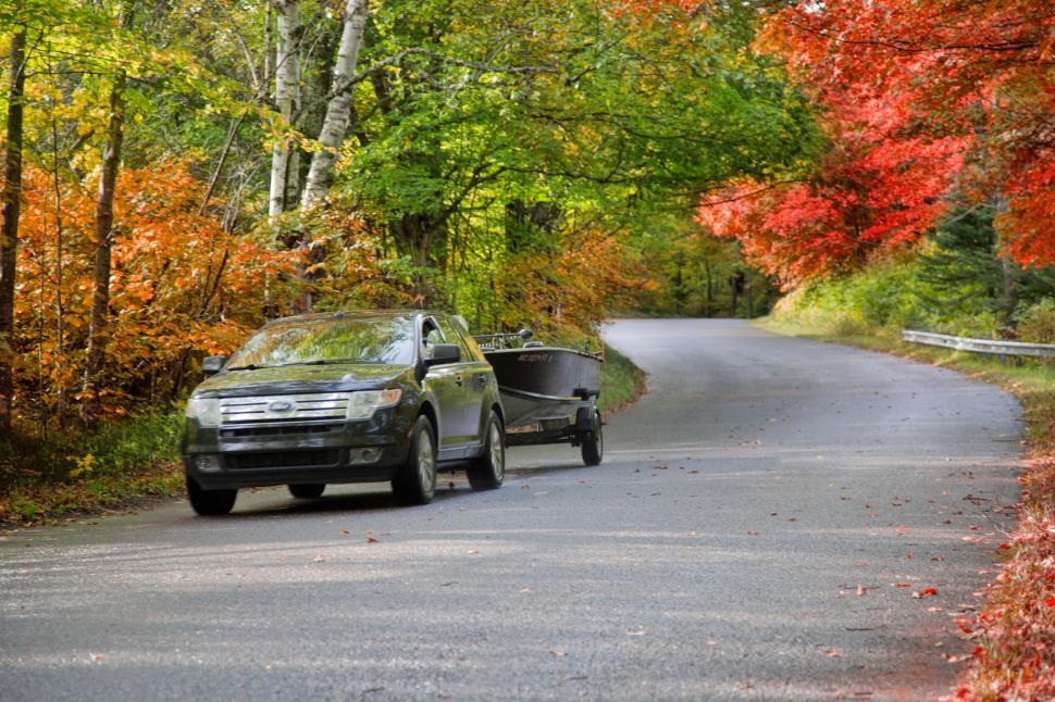 Free Image of Car and Autumn Trees  