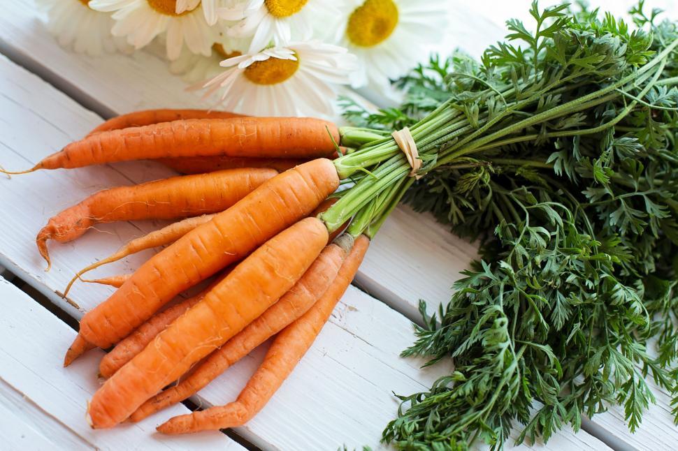 Free Image of Carrots and Flowers  