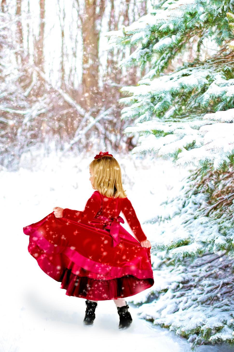 Free Image of Little Girl in Red Dress and Snow  