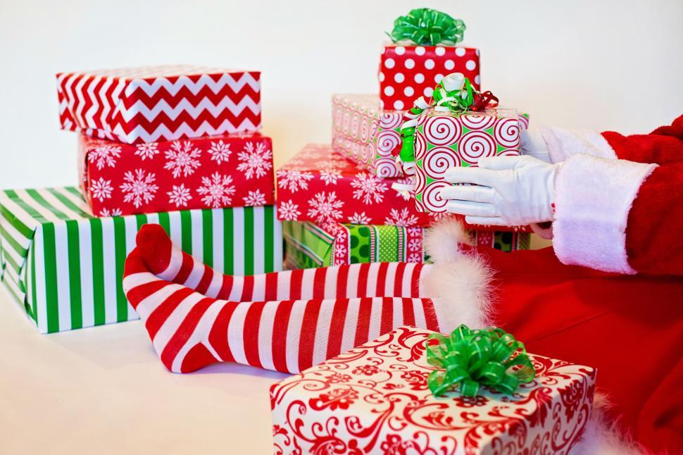 Free Image of Santa Woman With Presents - Face not seen  
