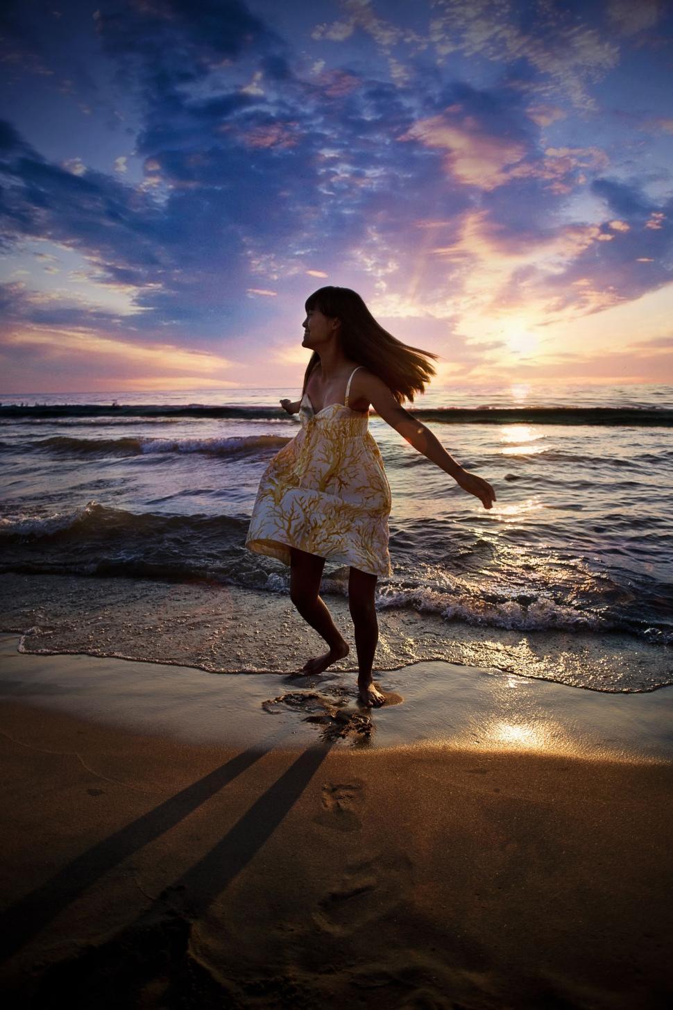 Free Image of Young Girl enjoying at the Beach 