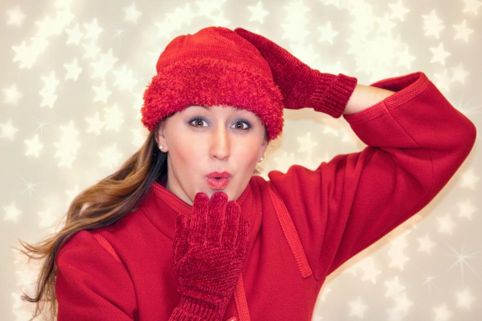 Free Image of Woman in Red Cap Blowing Kiss - Looking at camera 