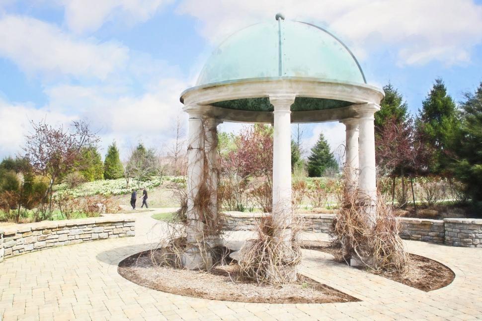 Free Image of Columned concrete gazebo in the garden  