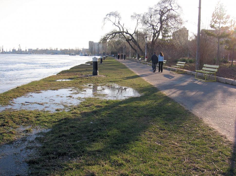 Free Image of flood water on local park walkway after heavy rain fall 