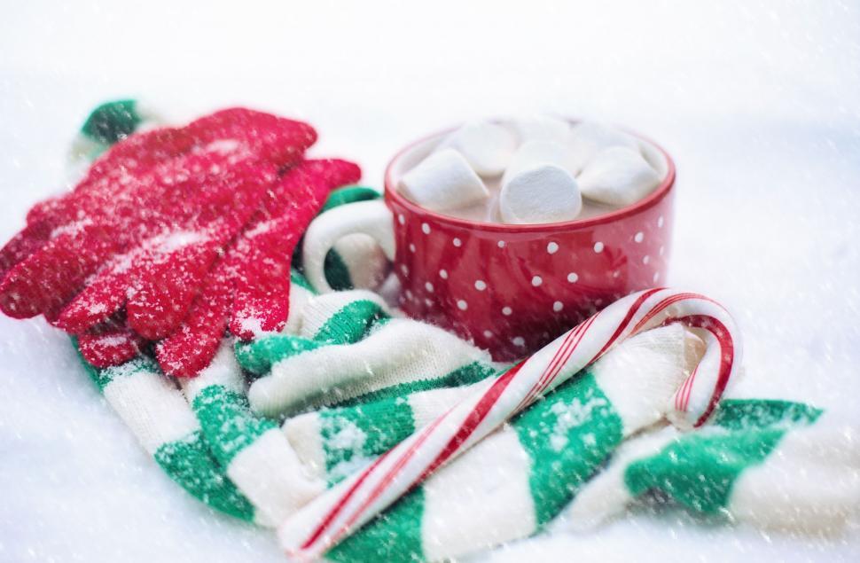 Free Image of Coffee and Scarf With Candy Cane in Snow 