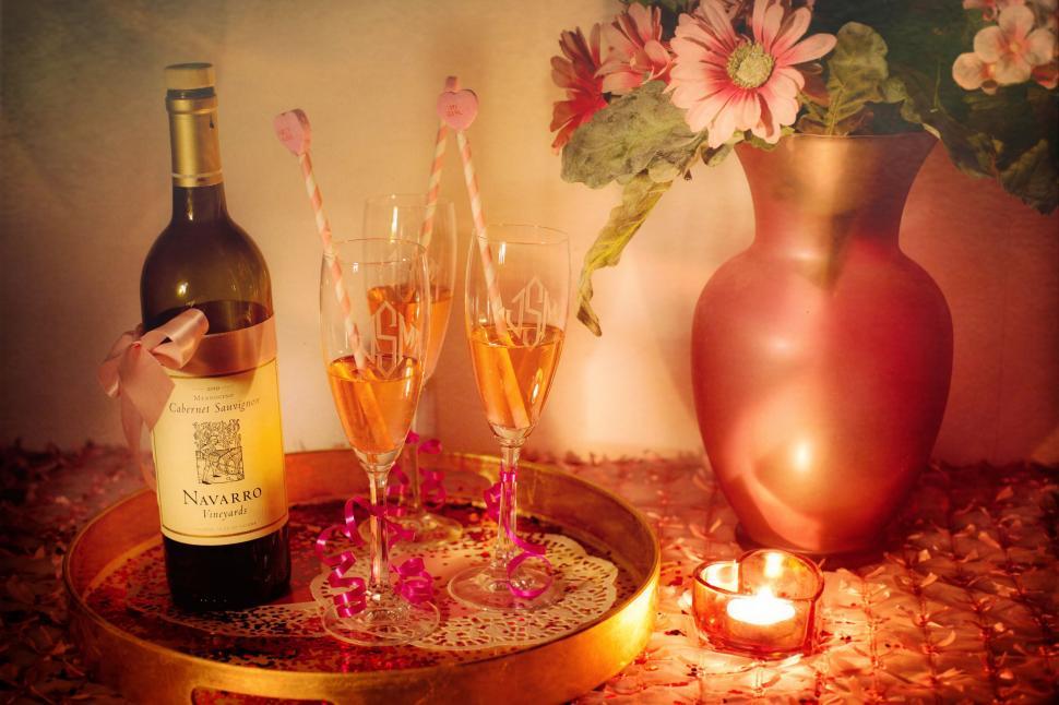 Free Image of Lit Candle With Wine Bottle and Glasses  