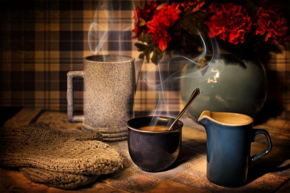 Free Image of Coffee Mugs With Gray Knitted Gloves 