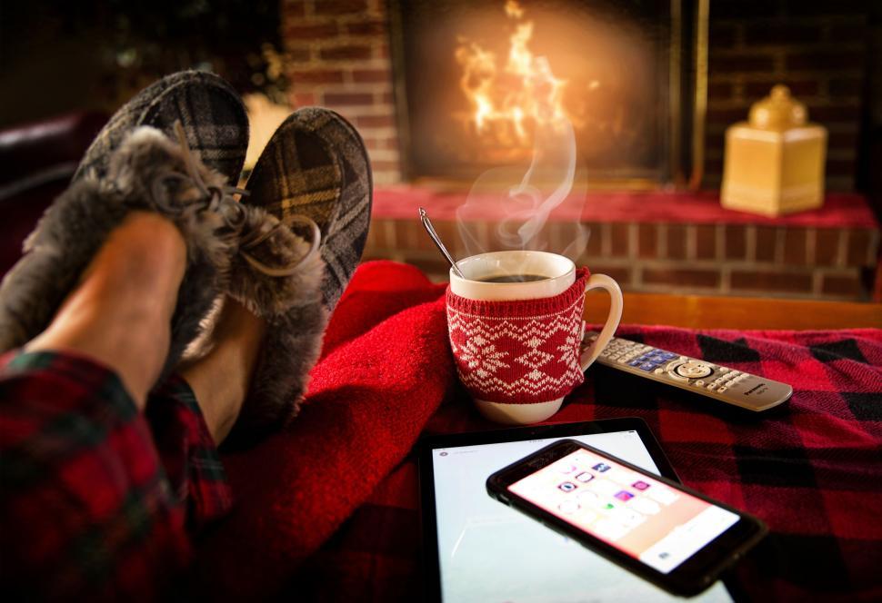 Free Image of Relaxing With Red Knitted Coffee Cup And iPhone 