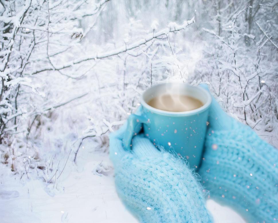 Free Image of Hands With Aqua Coffee Mug In Snow 