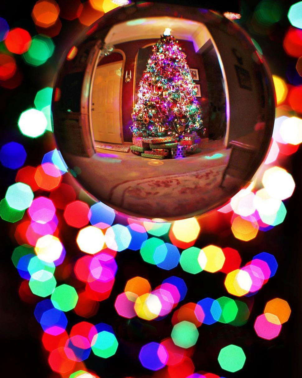 Download Free Stock Photo of Xmas Crystal ball with colorful bokeh lights 