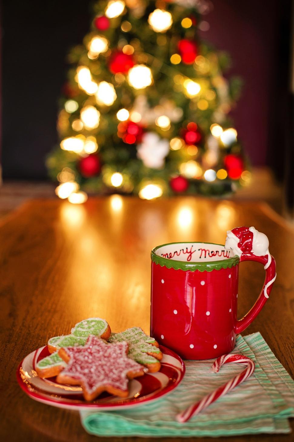 Download Free Stock Photo of Red Coffee Mug with Cookies And Christmas Tree 