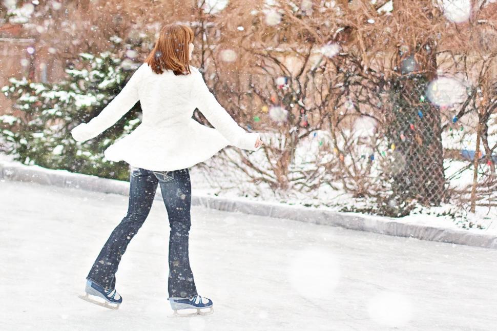 Free Image of Female ice skater with snow 