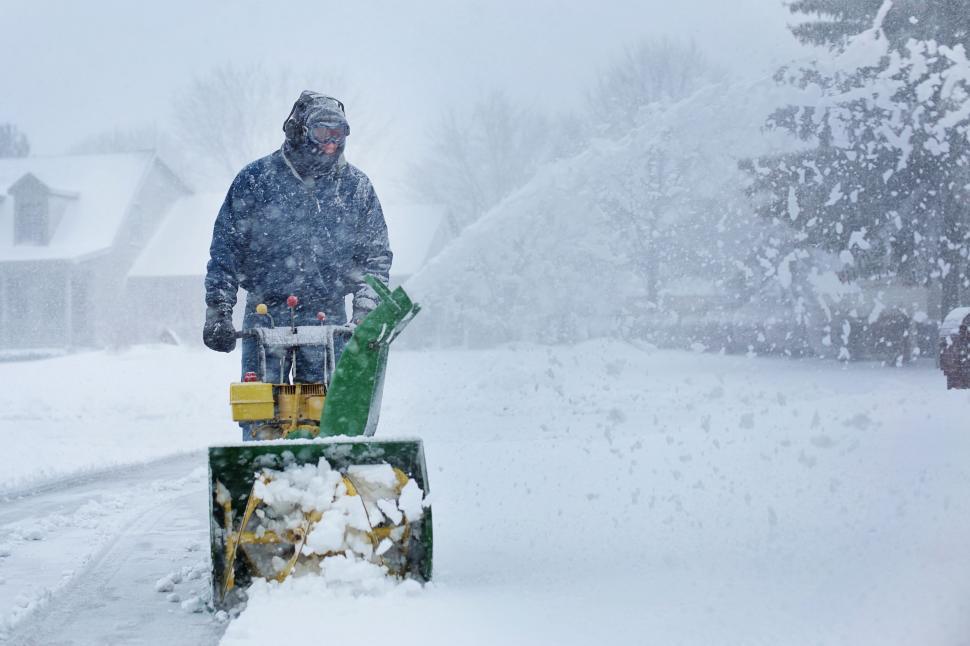 Free Image of Man and Snow blower 