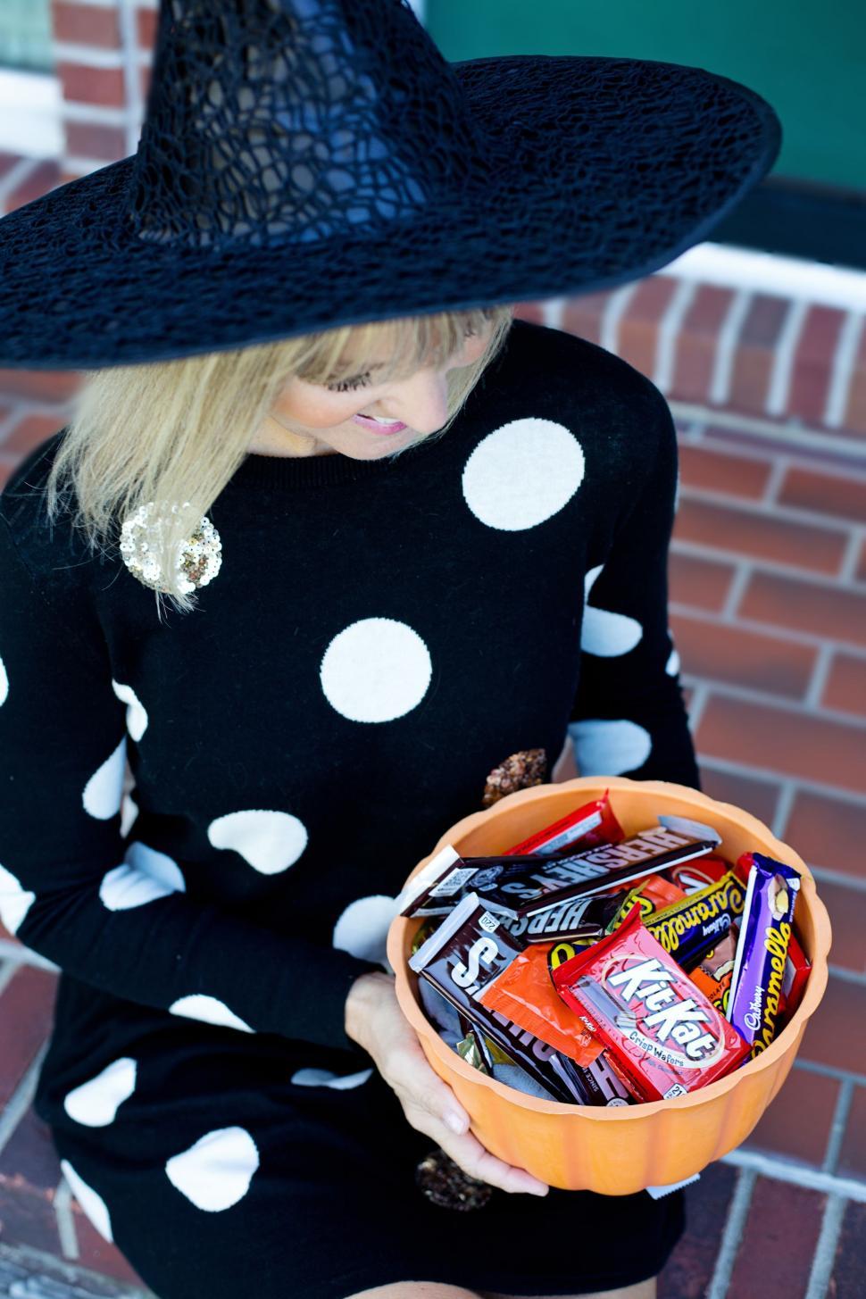 Free Image of Woman With Chocolates - trick-or-treat 